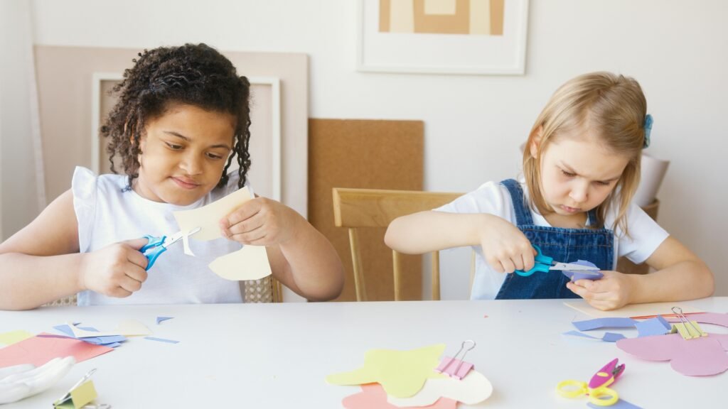 Celebrating small victories in special needs homeschooling, like mastering cutting with scissors